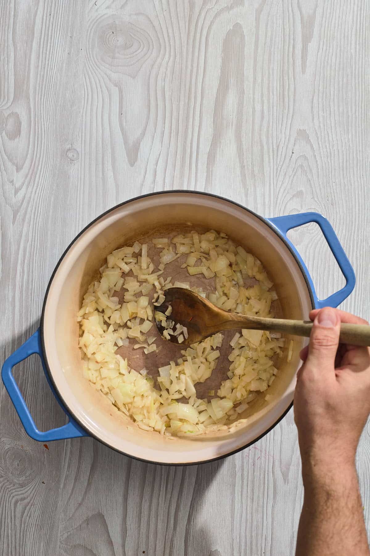 onion sauteeing in a pan