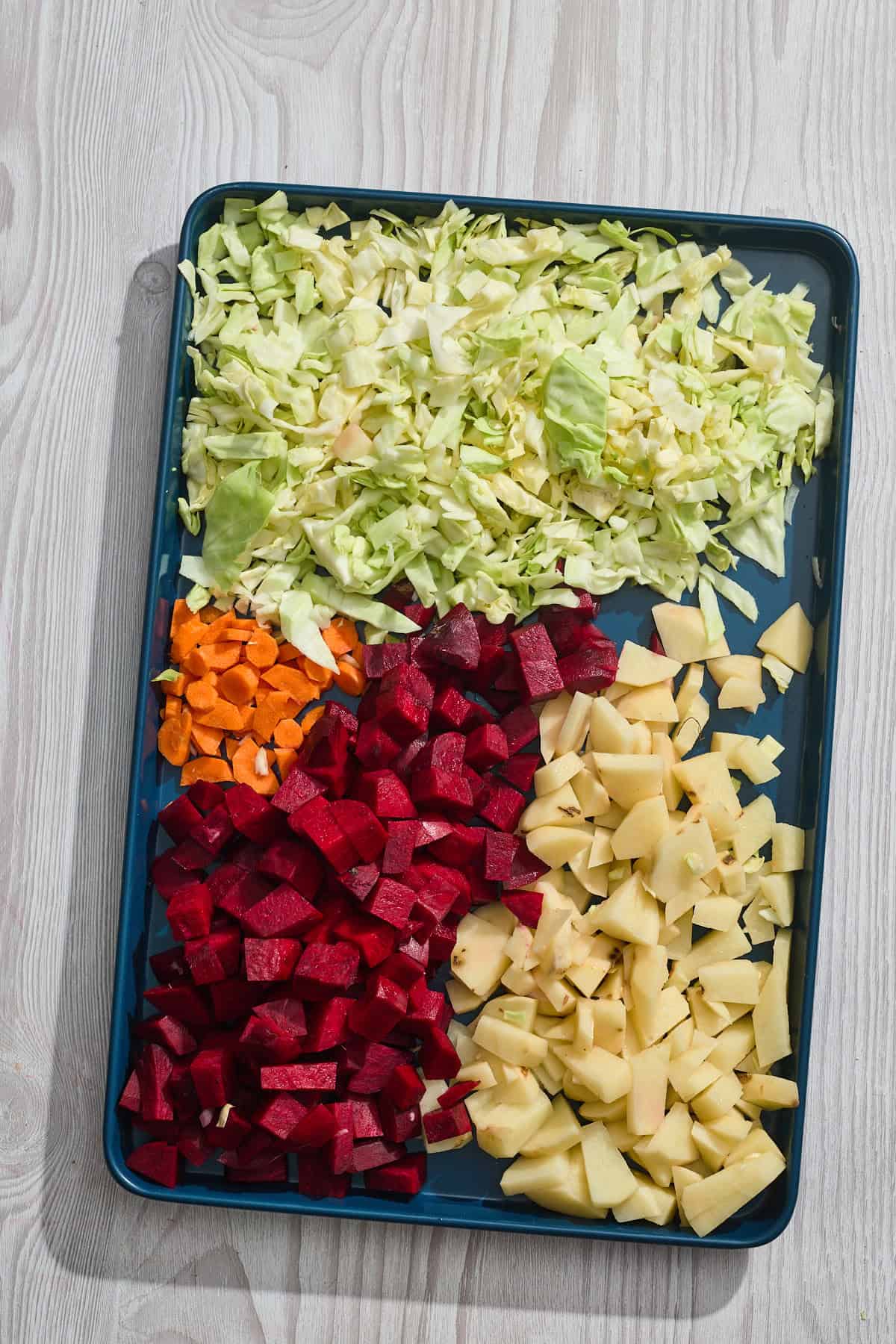 chopepd vegetables on a tray