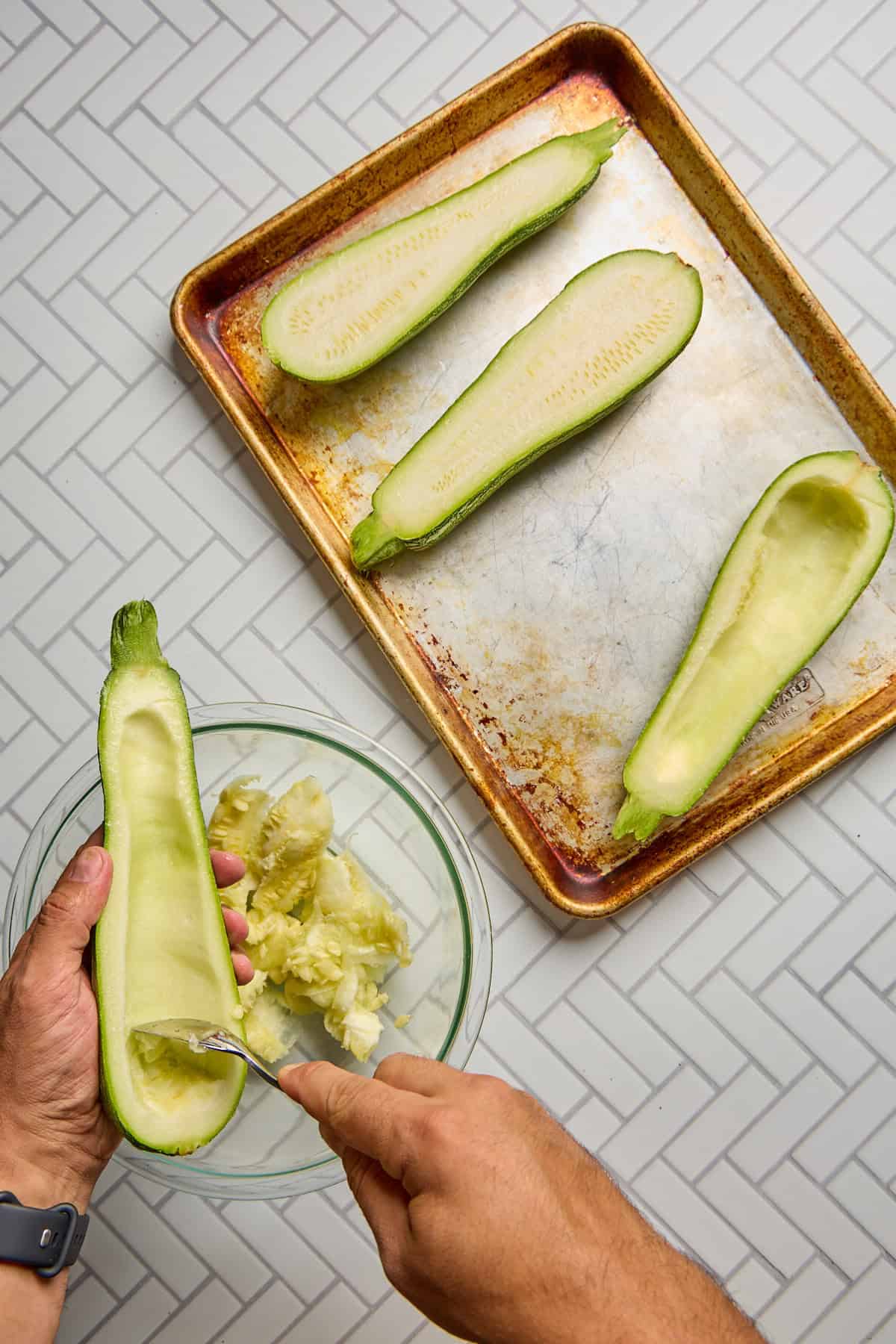 zucchini being scooped out