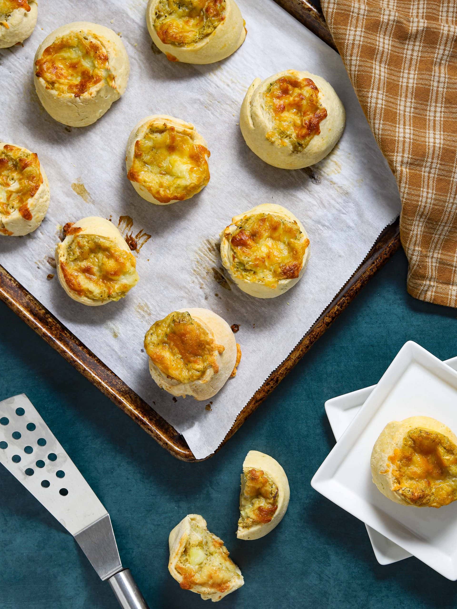 potato knishes baked on baking sheet