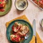 Plated golumpki recipe with beef and rice filling topped with parsley