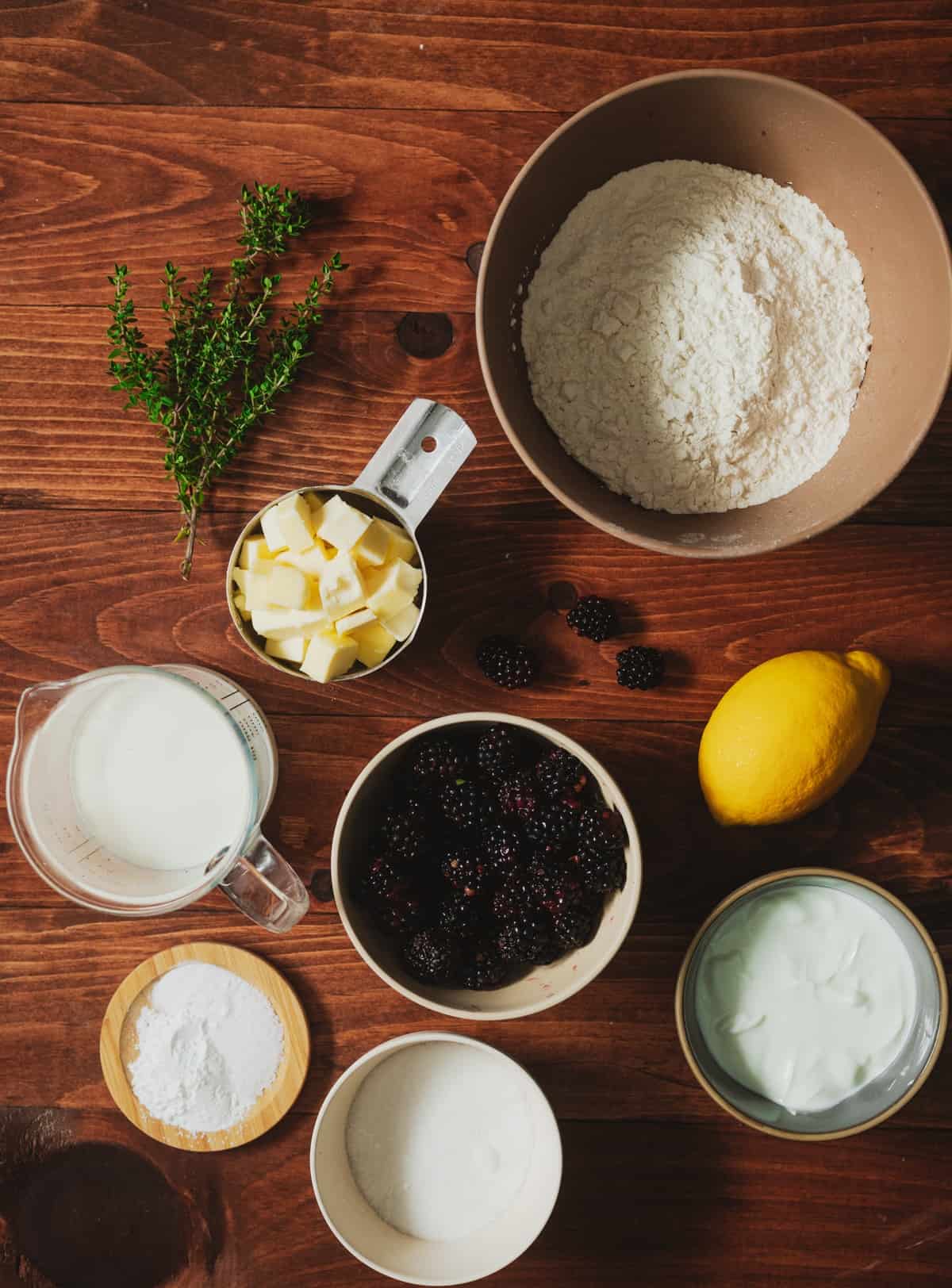 ingredients laid out in bowls for making blackberry scones