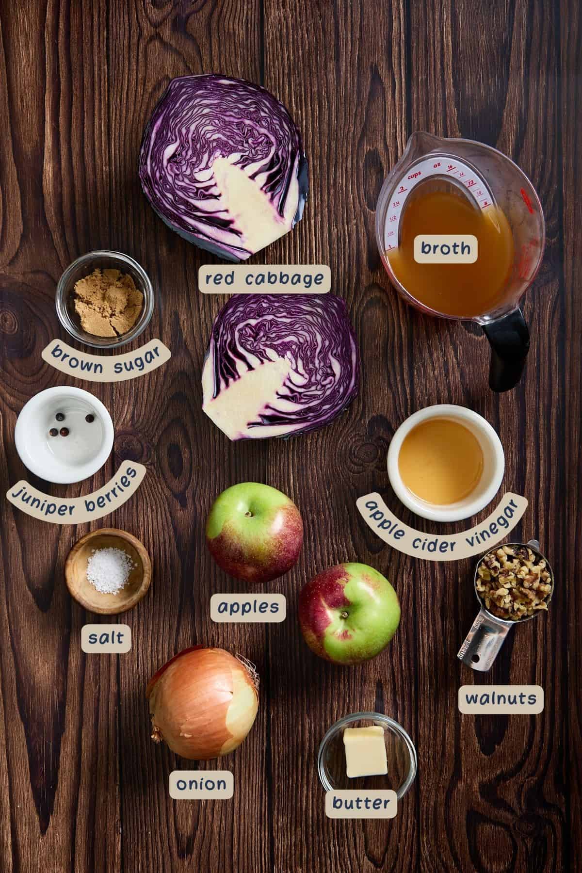 ingredients for making the cabbage on a dark wooden table