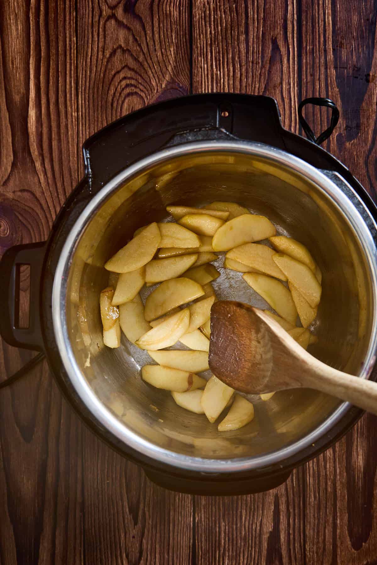 apples being sauteed in instant pot
