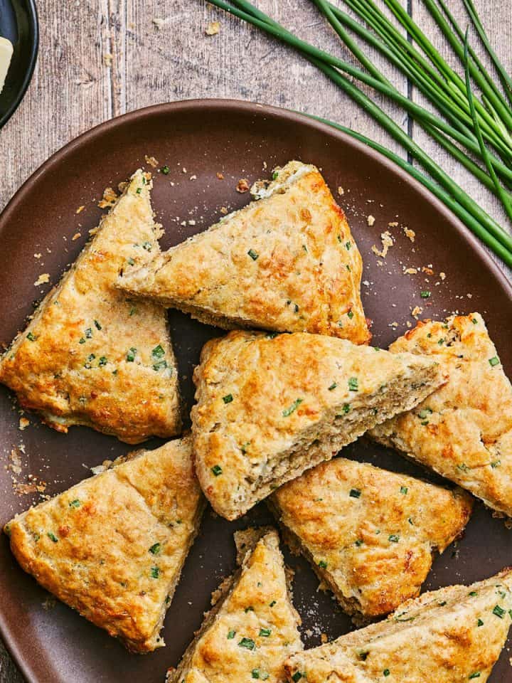 cheese scones on plate with chives