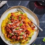 plates of spaghetti squash with meat sauce