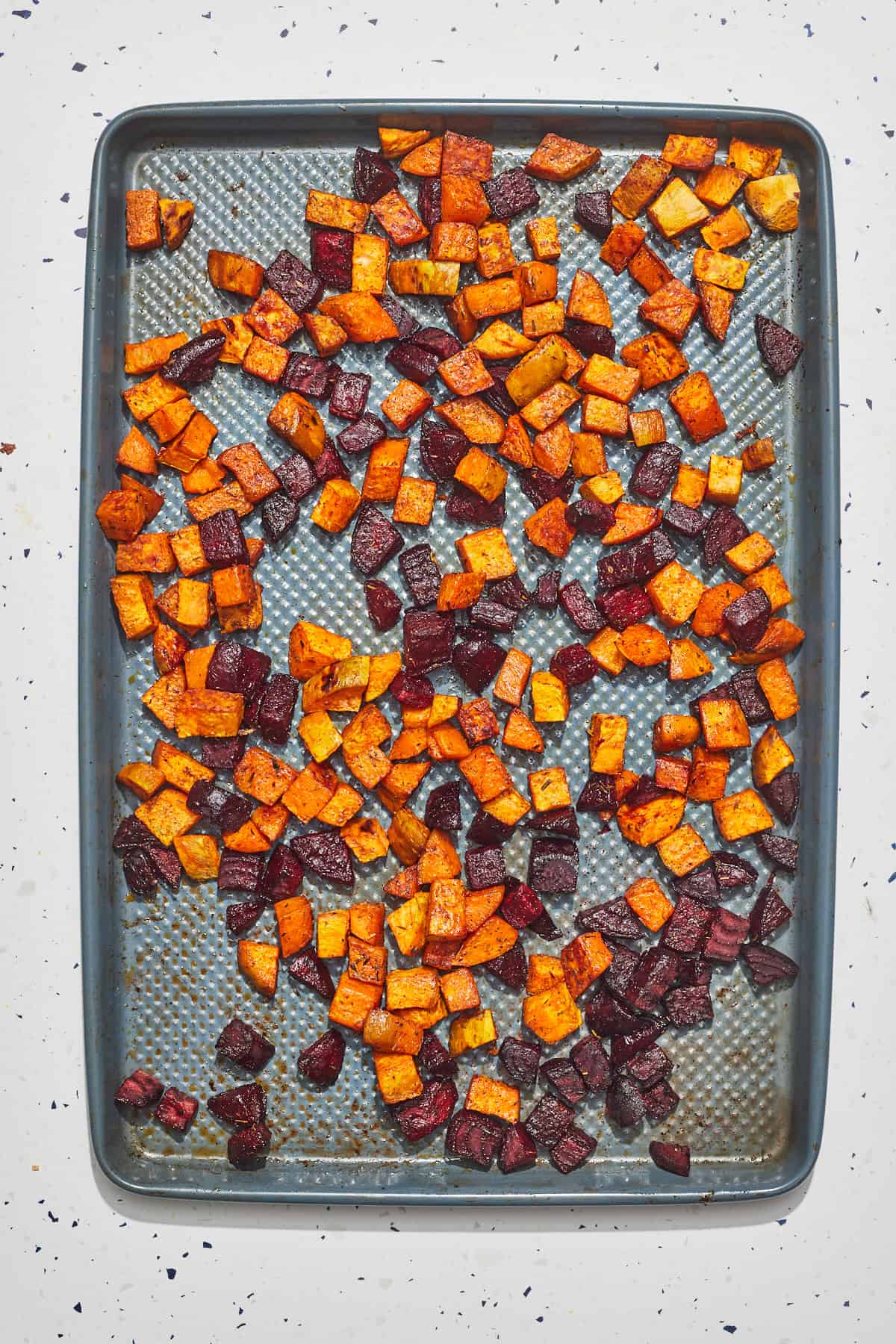 tray of roasted sweet potatoes and beets
