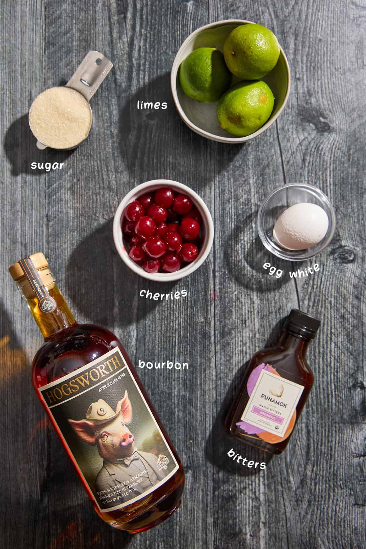 bourbon and other ingredients for the cocktail