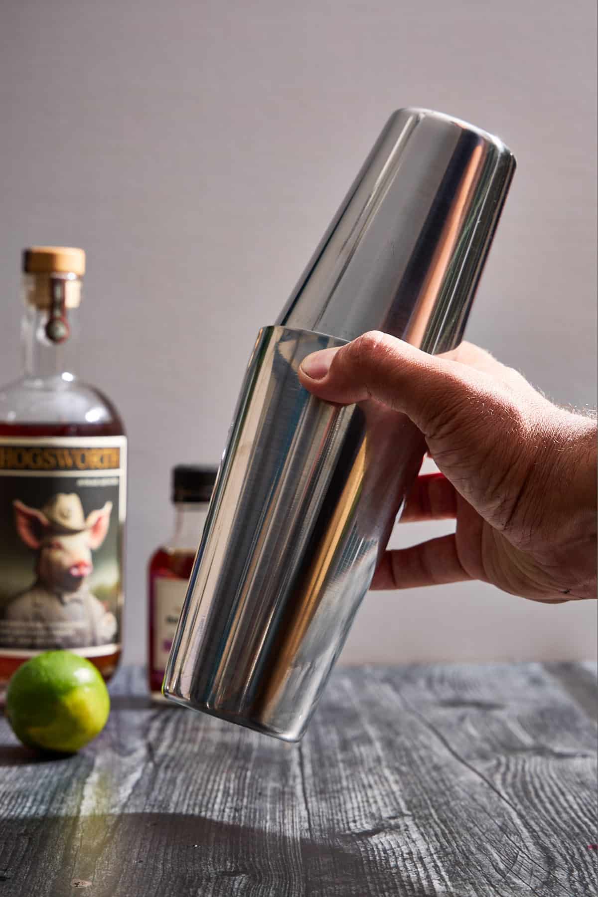 shaking a cocktail shaker