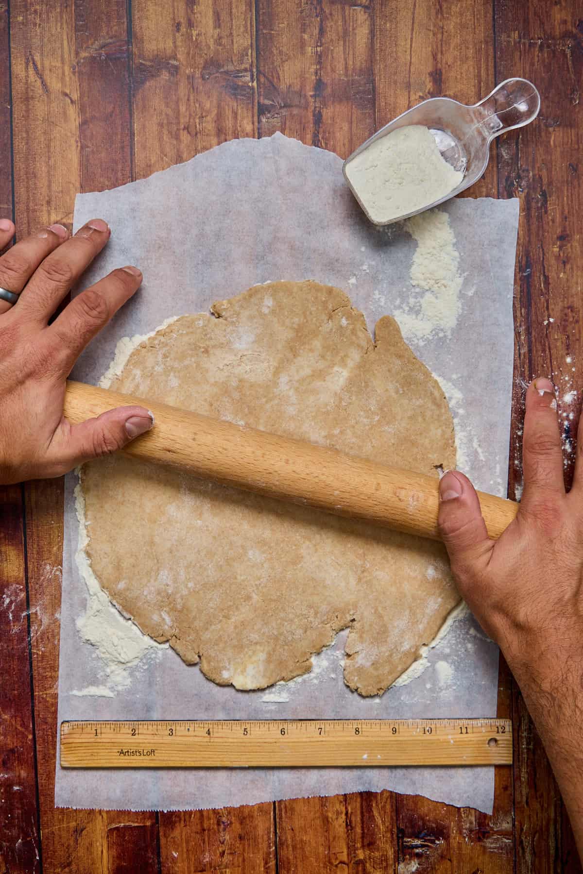 galette dough rolled out on parchment