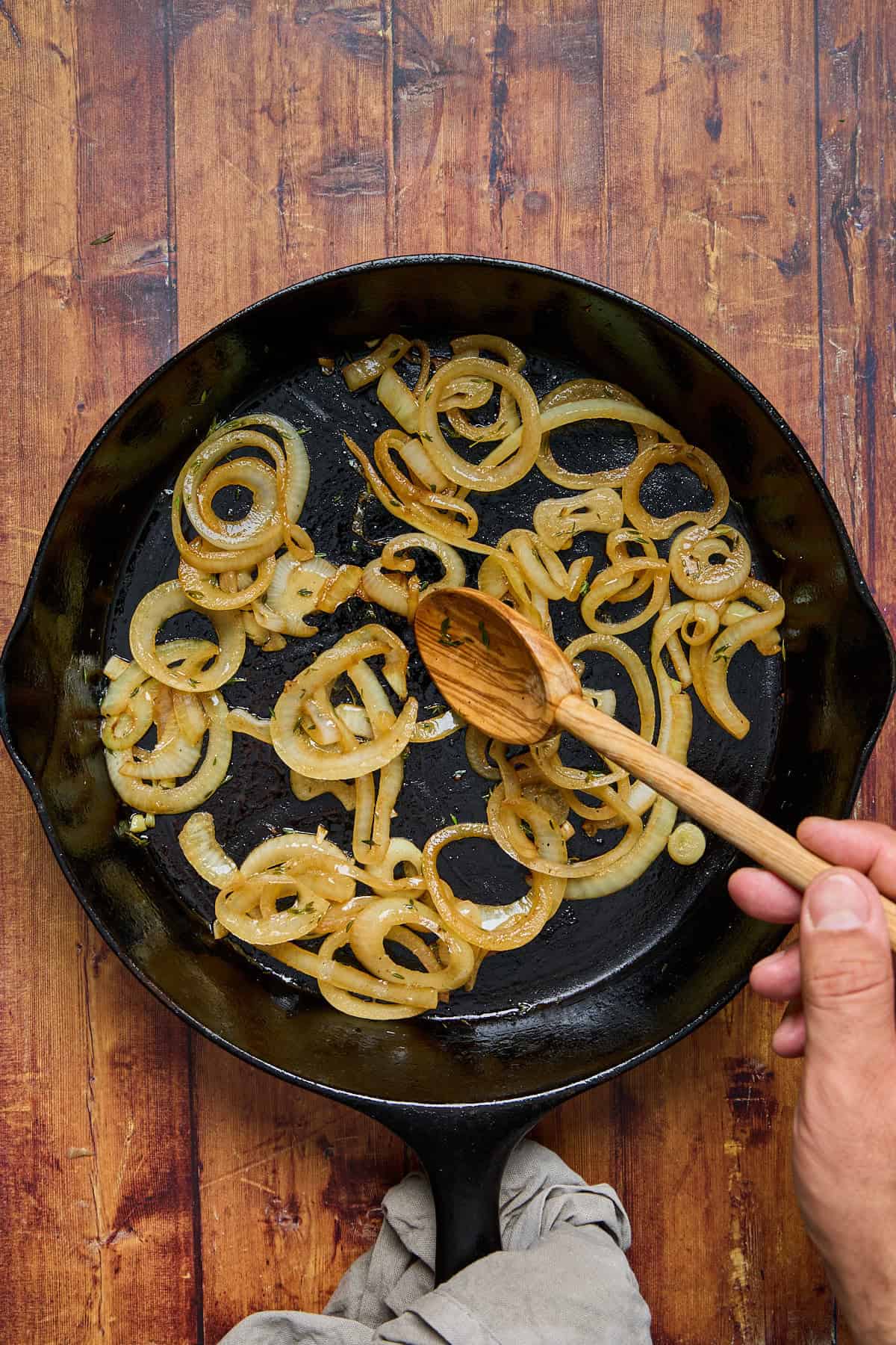 onions browning in a pan 