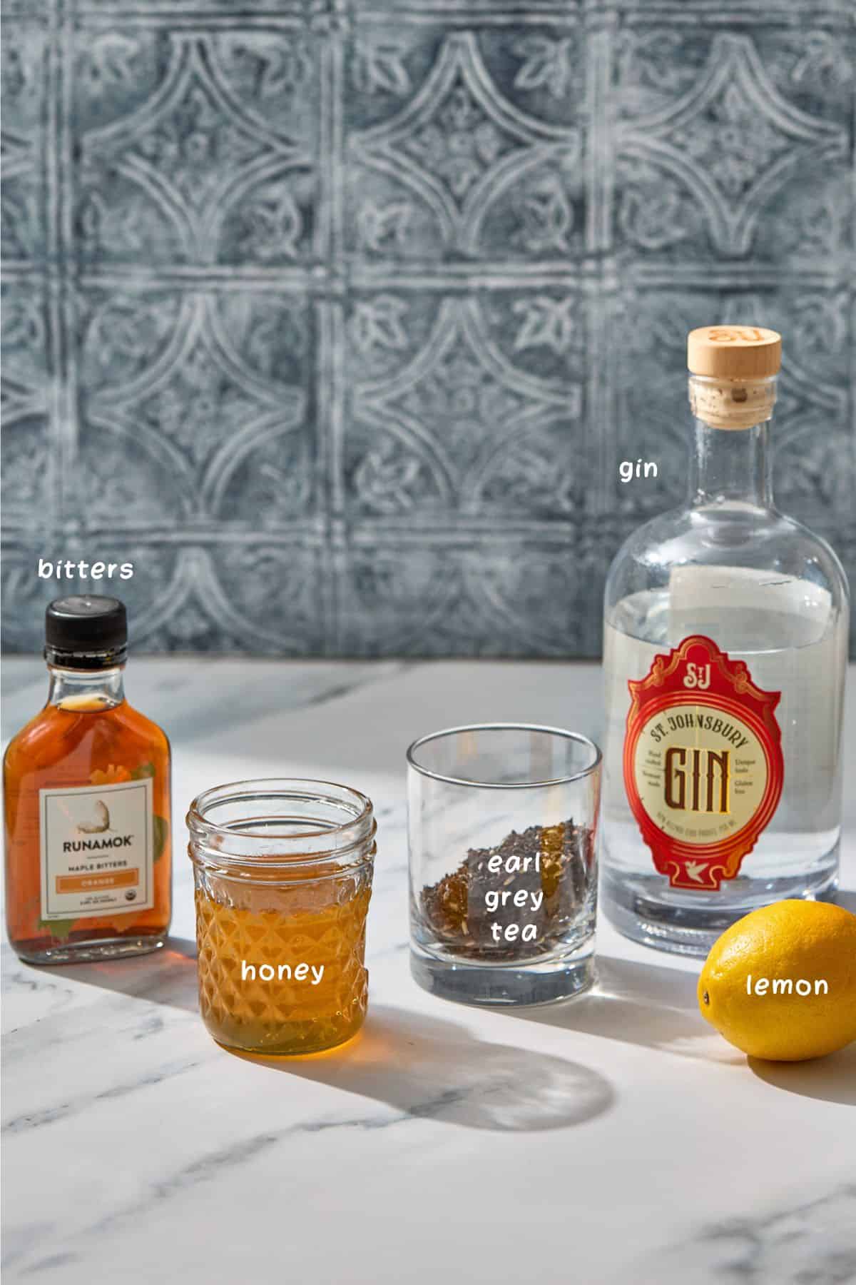 ingredients for making the cocktail on a counter