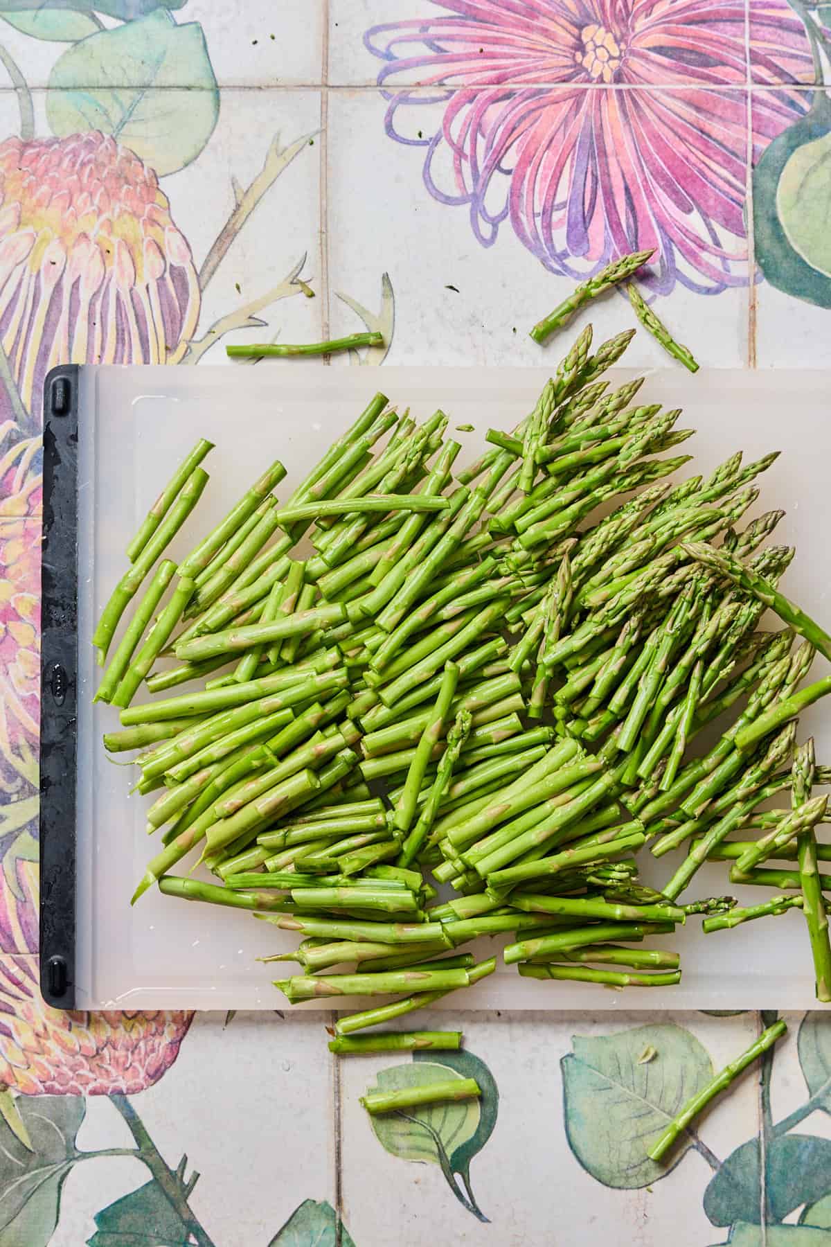 asparagus on a cutting board cut into thirds