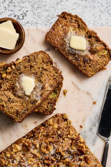 slices of rhubarb quick bread with butter